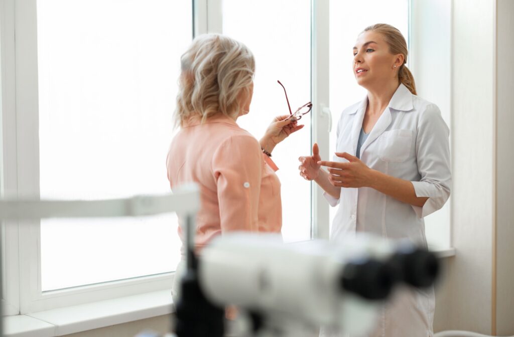 A patient discusses safety eyewear with her optometrist.