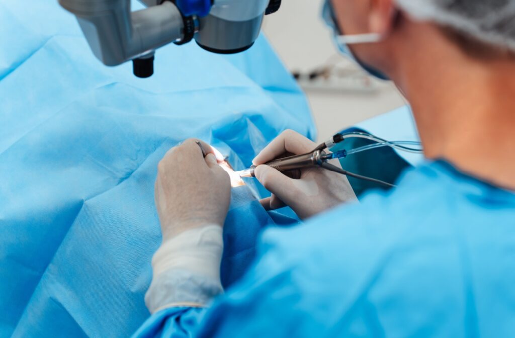 An over the shoulder view of an ophthalmologist performing cataract surgery